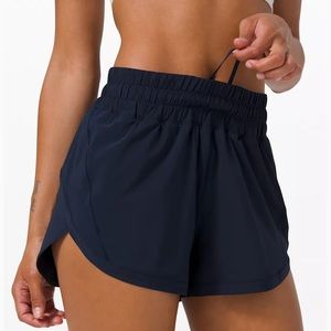 LULULEMON “TRACK THAT” 3” short in NAVY